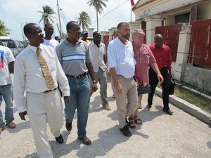 Greg, Father Marc Bosivert, Bill Nemitz and the local delegates