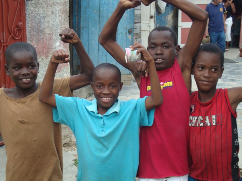 Young Haitian boys posing for the camera. Smiles??