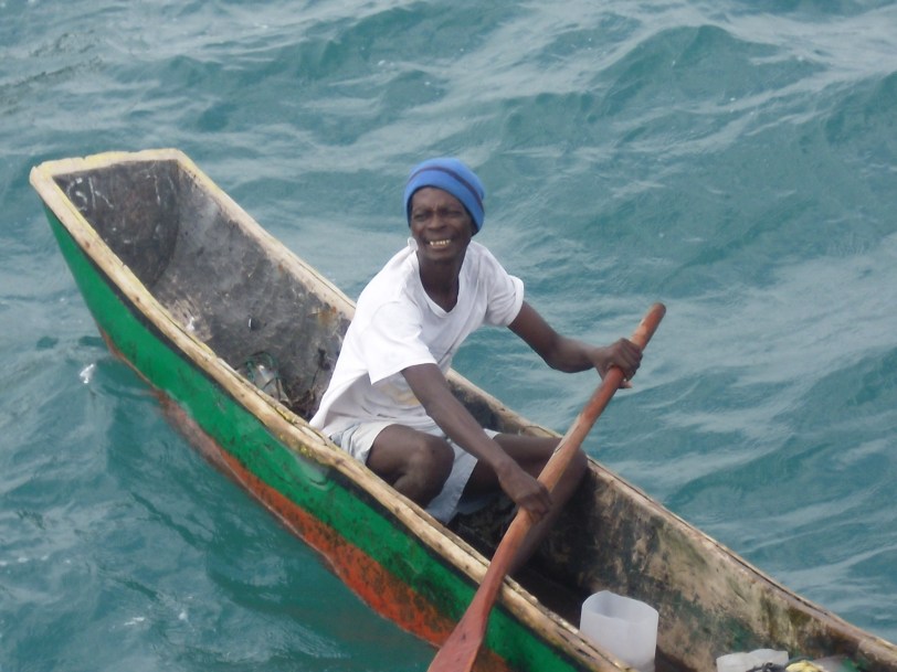 A lone Haitian I threw care packages to