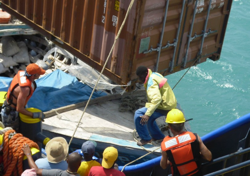 Alex taking control of  the offloading of the containers